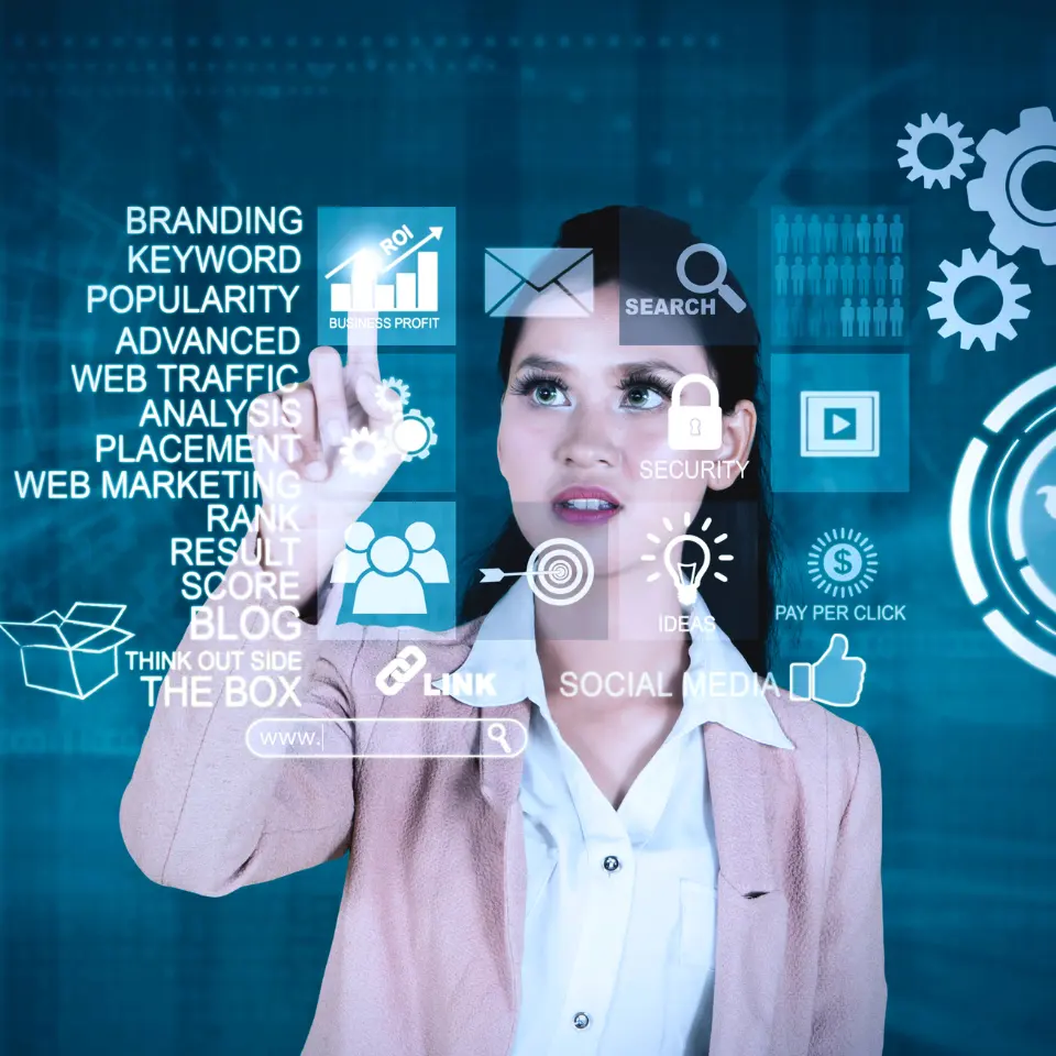 Businesswoman interacting with virtual digital marketing interface showing SEO, social media, and analytics icons.