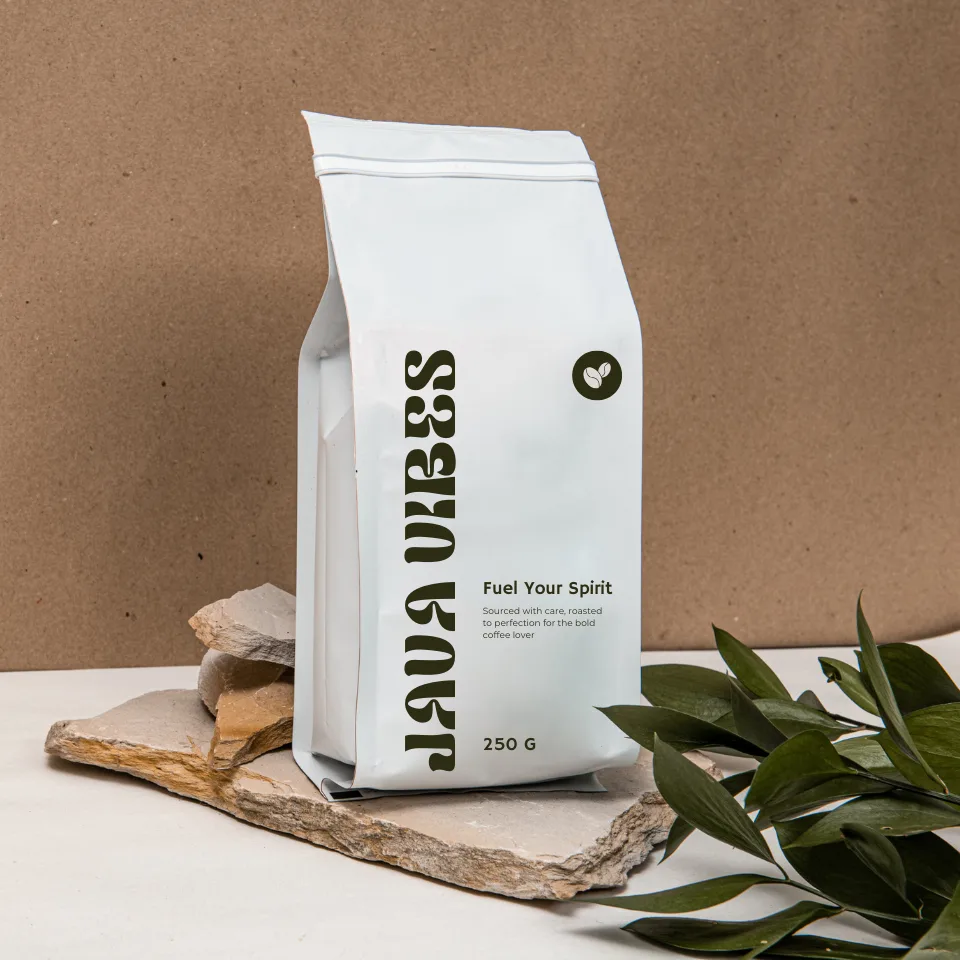 white-coffee-bag-labeled-leaf-vibes-on-wooden-board-with-green-plant-against-brown-background