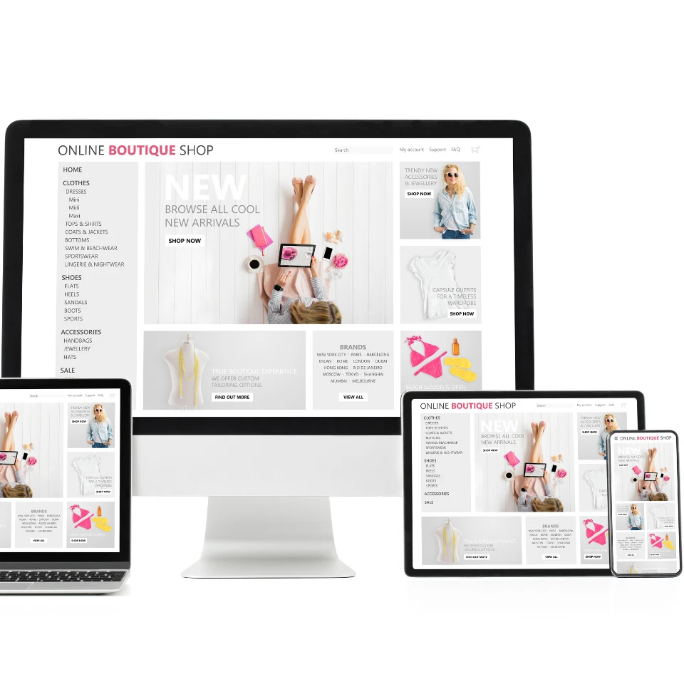 Responsive online boutique shop website displayed on desktop, laptop, tablet, and smartphone screens